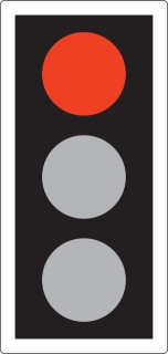 RED means ‘Stop’. Wait behind the stop line on the carriageway